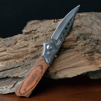 Нож складной в чехле под дерево с круглыми прорезями