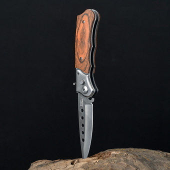 Нож складной в чехле под дерево с круглыми прорезями