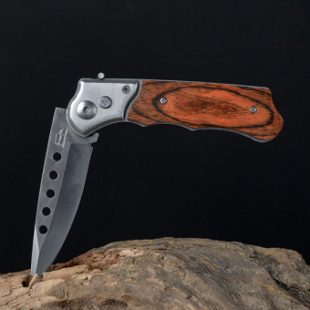 Нож складной в чехле под дерево с круглыми прорезями